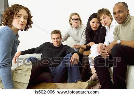 Portrait of friends on sofa View Large Photo Image Stock Photograph - Portrait of friends on sofa. Fotosearch