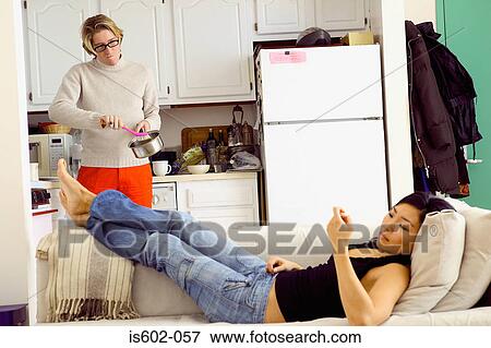 Young couple in apartment View Large Photo Image Stock Photo - Young couple in apartment. Fotosearch