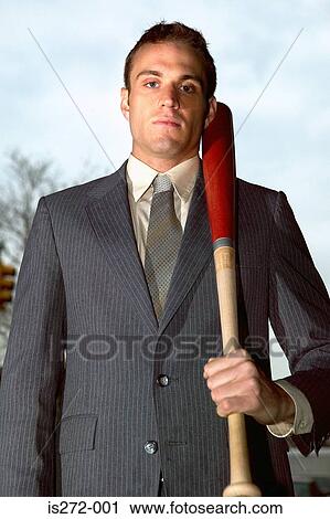 Businessman holding baseball bat View Large Photo Image Stock Image - Businessman holding baseball bat. Fotosearch