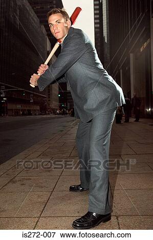 Businessman holding baseball bat View Large Photo Image Stock Photo - Businessman holding baseball bat. Fotosearch