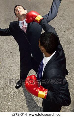 Businessmen boxing View Large Photo Image Picture - Businessmen boxing. Fotosearch