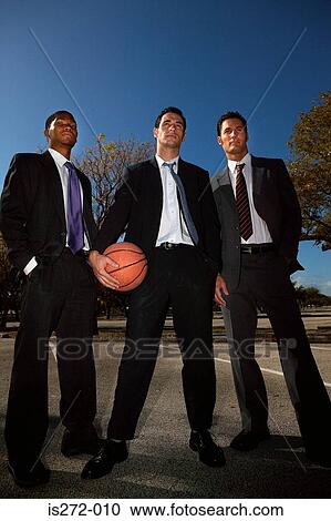 Businessmen on basketball court View Large Photo Image Stock Image - Businessmen on basketball court. Fotosearch