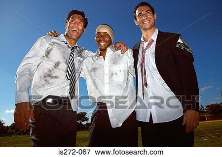 Businessmen playing rugby View Large Photo Image Stock Photo - Businessmen playing rugby. Fotosearch