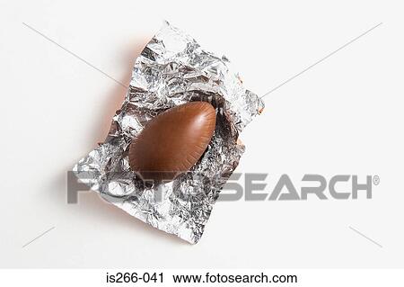 Stock Image - Chocolate in foil wrapper. Fotosearch
