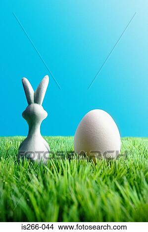 Easter bunny and egg View Large Photo Image Picture - Easter bunny and egg. Fotosearch