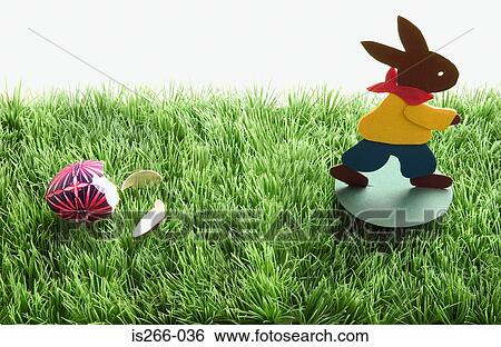 Easter bunny running from egg View Large Photo Image Stock Photograph - Easter bunny running from egg. Fotosearch