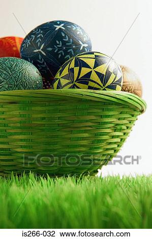 Easter eggs in basket View Large Photo Image Stock Image - Easter eggs in basket. Fotosearch