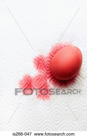 Egg covered in red paint View Large Photo Image Stock Photo - Egg covered in red paint. Fotosearch