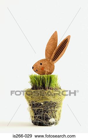 Wooden rabbit in grass View Large Photo Image Stock Photo - Wooden rabbit in grass. Fotosearch