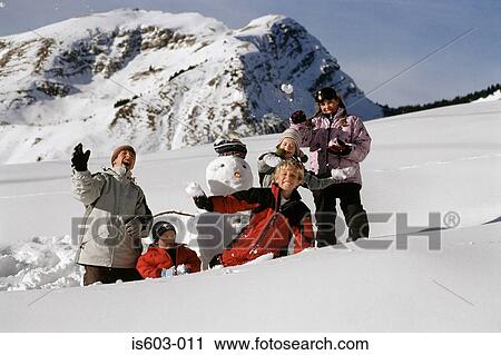 Children playing in snow View Large Photo Image Stock Image - Children playing in snow. Fotosearch