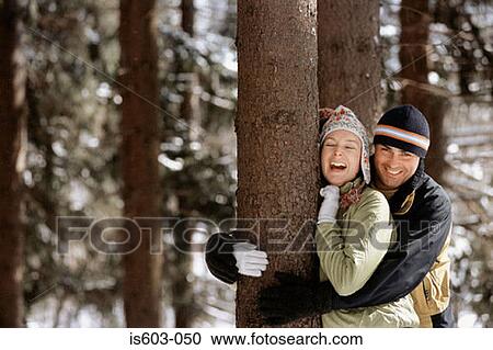 Smiling couple in forest View Large Photo Image Stock Image - Smiling couple in forest. Fotosearch