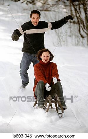 Woman riding a sleigh View Large Photo Image Stock Photography - Woman riding a sleigh. Fotosearch