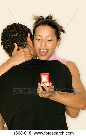 Engaged young couple View Large Photo Image Stock Photo - Engaged young couple. Fotosearch