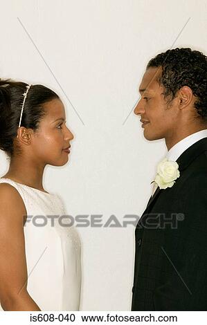 Stock Image - Profile of newlywed couple. Fotosearch