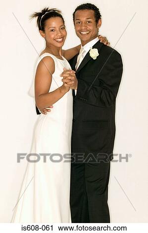 Stock Image - Smiling newlyweds. Fotosearch