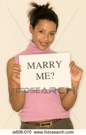 Young woman proposing View Large Photo Image Stock Image - Young woman proposing. Fotosearch