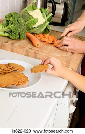 Child reaching for a biscuit View Large Photo Image Stock Image - Child reaching for a biscuit. Fotosearch