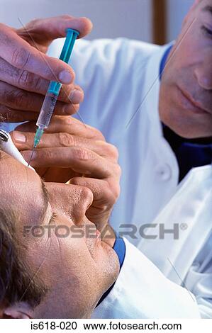 Man having BOTOX ® injections View Large Photo Image Stock Image - Man having BOTOX ® injections. Fotosearch