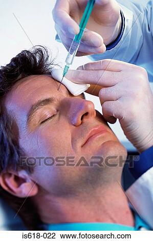 Man having BOTOX ® injections View Large Photo Image Stock Image - Man having BOTOX ® injections. Fotosearch