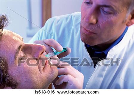 Man having BOTOX ® injections View Large Photo Image Stock Photograph - Man having BOTOX ® injections. Fotosearch
