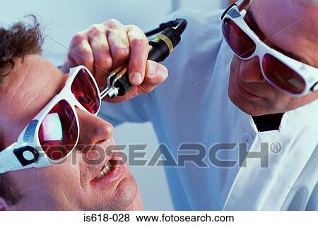 Man having laser hair removal View Large Photo Image Stock Photo - Man having laser hair removal. Fotosearch