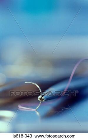 Stock Image - Surgical tweezers. Fotosearch