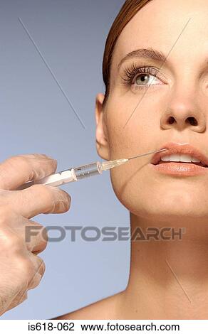 Woman having a BOTOX ® injection View Large Photo Image Stock Image - Woman having a BOTOX ® injection. Fotosearch
