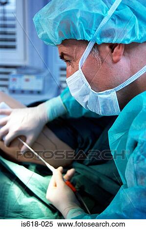 Woman having liposuction View Large Photo Image Stock Photography - Woman having liposuction. Fotosearch