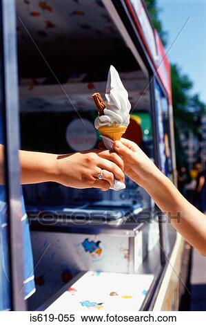 Stock Photography - Child reaching for an ice cream. Fotosearch