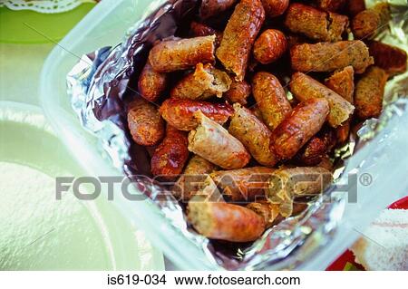 Cocktail sausages in tub View Large Photo Image Picture - Cocktail sausages in tub. Fotosearch