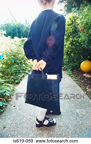 Girl wearing a school uniform View Large Photo Image Stock Photo - Girl wearing a school uniform. Fotosearch