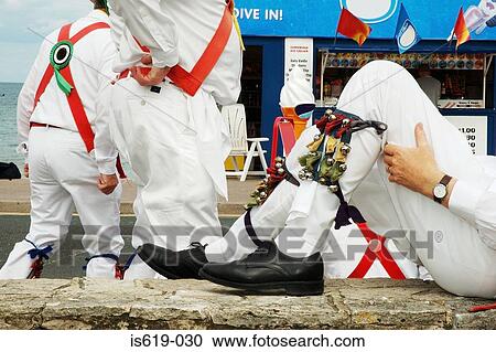 Morris dancers relaxing View Large Photo Image Stock Image - Morris dancers relaxing. Fotosearch