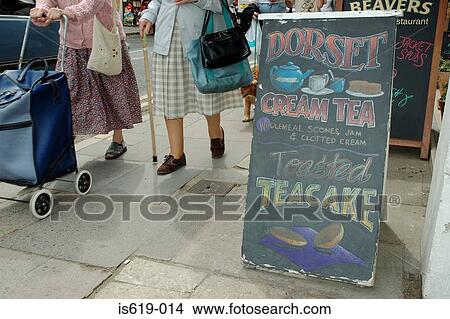 Senior women walking near cafe View Large Photo Image Picture - Senior women walking near cafe. Fotosearch