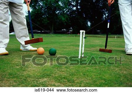 Two men playing croquet View Large Photo Image Picture - Two men playing croquet. Fotosearch