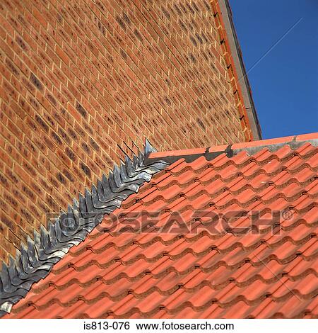 Brick wall and tiled roof View Large Photo Image Stock Photograph - Brick wall and tiled roof. Fotosearch