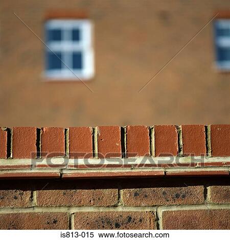 Brick wall near house View Large Photo Image Stock Photography - Brick wall near house. Fotosearch