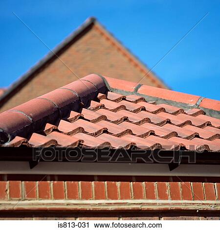 Stock Image - House with tiled roof. Fotosearch