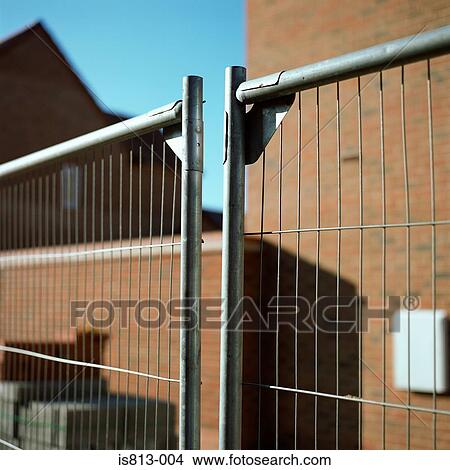 Metal fence near house View Large Photo Image Picture - Metal fence near house. Fotosearch