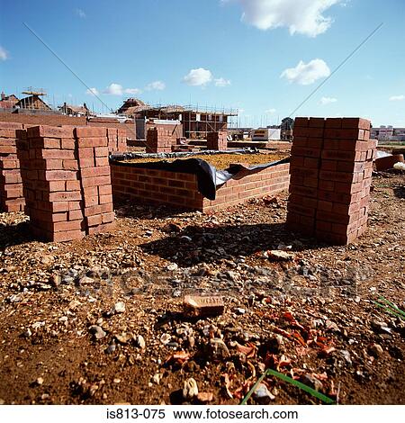 Stacked bricks on construction site View Large Photo Image Stock Photography - Stacked bricks on construction site. Fotosearch