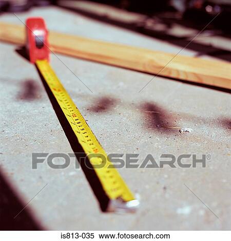Tape measure and timber View Large Photo Image Stock Photography - Tape measure and timber. Fotosearch