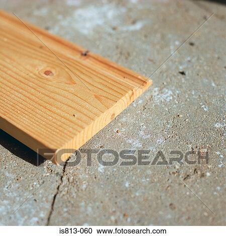 Timber on concrete floor View Large Photo Image Stock Image - Timber on concrete floor. Fotosearch