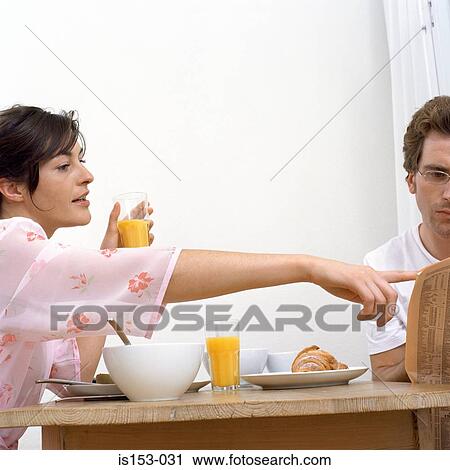 Couple at breakfast table View Large Photo Image Stock Image - Couple at breakfast table. Fotosearch