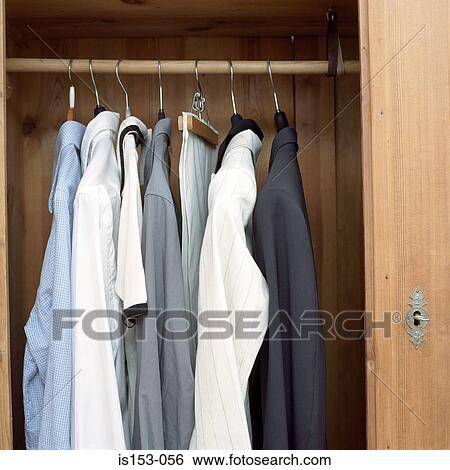 Cupboard with male shirts View Large Photo Image Stock Photograph - Cupboard with male shirts. Fotosearch