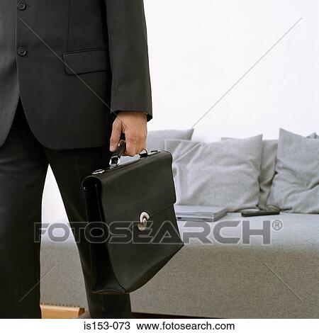 Man leaving with briefcase View Large Photo Image Stock Image - Man leaving with briefcase. Fotosearch