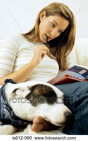 Lady owner with dog indoors View Large Photo Image Stock Image - Lady owner with dog indoors. Fotosearch