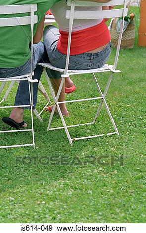 Stock Photo - Couple at al fresco meal.. Fotosearch