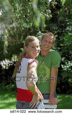 Happy couple in the garden. View Large Photo Image Stock Image - Happy couple in the garden.. Fotosearch