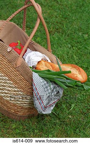 Picnic basket on the grass. View Large Photo Image Stock Photo - Picnic basket on the grass.. Fotosearch