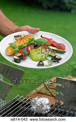 Plate of food at barbeque View Large Photo Image Stock Image - Plate of food at barbeque. Fotosearch