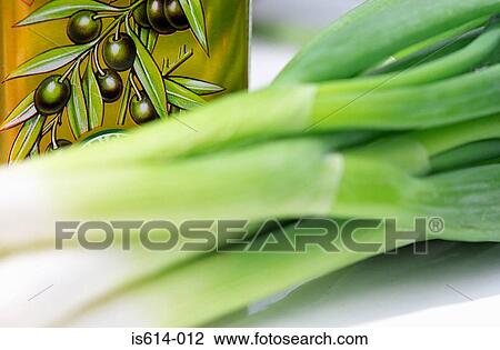 Spring onions and olive oil. View Large Photo Image Stock Image - Spring onions and olive oil.. Fotosearch